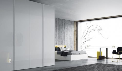 Wardrobe with four hinged doors in a modern bedroom