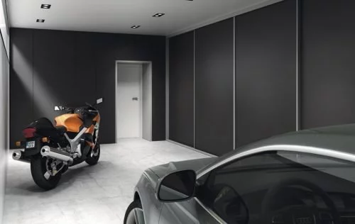 Wardrobe with four doors in colour Vulcano inside the garage of the property