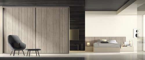 Wardrobe with two sliding doors in a modern adult bedroom