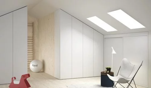 Loft with three made-to-measure wardrobes in colour Blanco