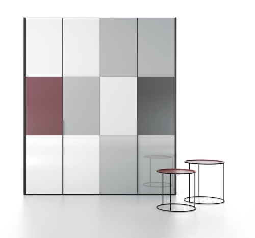 Wardrobe with five hinged doors and a panelling system