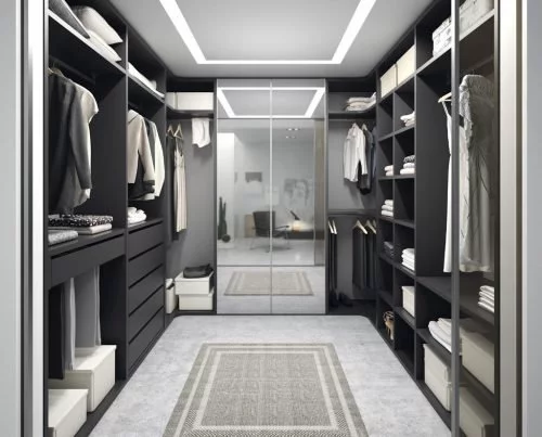 Walk-in wardrobe with mirrors on the doors of the wardrobe