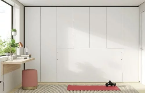 Integrated horizontal wall-bed within the wardrobes