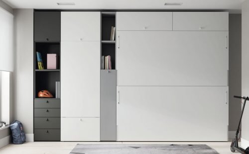 Wall bunk-bed integrated with a wardrobe and a foldable table