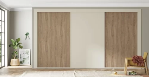 Built-in wardrobe with three sliding doors