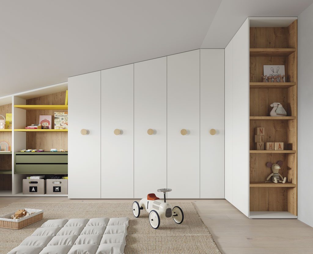 Custom wardrobes in the youth bedroom with sloped ceiling Custom wardrobes in the youth bedroom with sloped ceiling