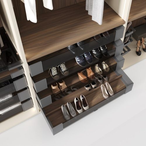 Detail of the pull-out shoe rack from the Elegance Line series for wardrobe interior