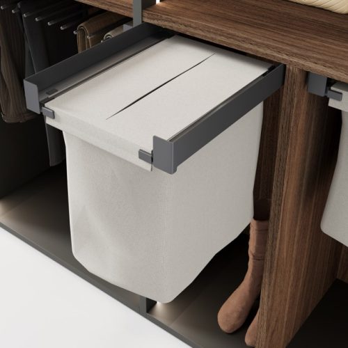 Detail of the pull-out laundry basket for wardrobe interiors