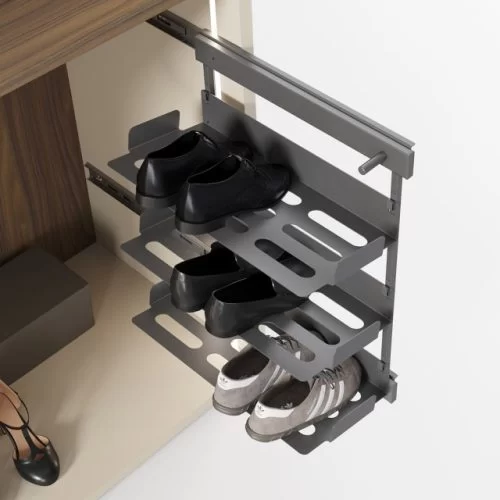Detail of the pull-out side shoe rack for wardrobe interiors