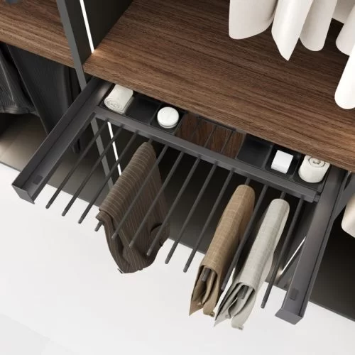Detail of the pull-out trouser rack from the Elegance Line series for wardrobe interiors
