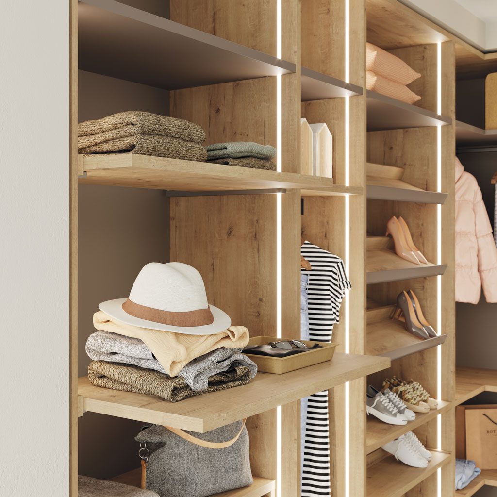 Detail of the pull-out shelves for clothes in the wardrobe Detail of the pull-out shelves for clothes in the wardrobe