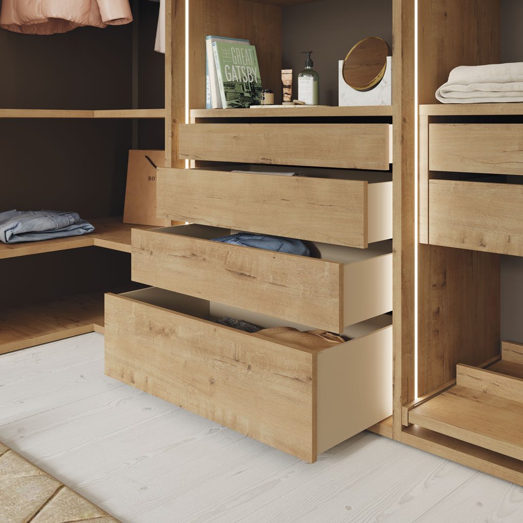 Detail of the interior wardrobe drawer unit with drawers of different sizes Detail of the interior wardrobe drawer unit with drawers of different sizes