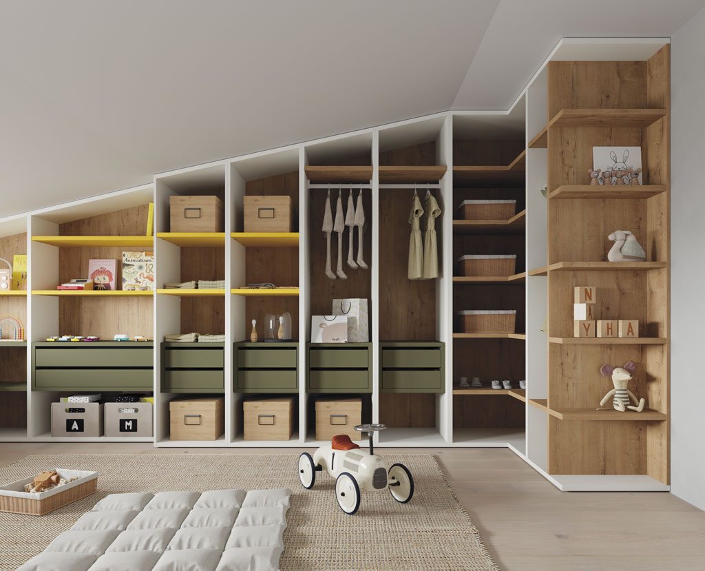 Detail of the interior of the wardrobe fitted into the sloped ceiling Detail of the interior of the wardrobe fitted into the sloped ceiling