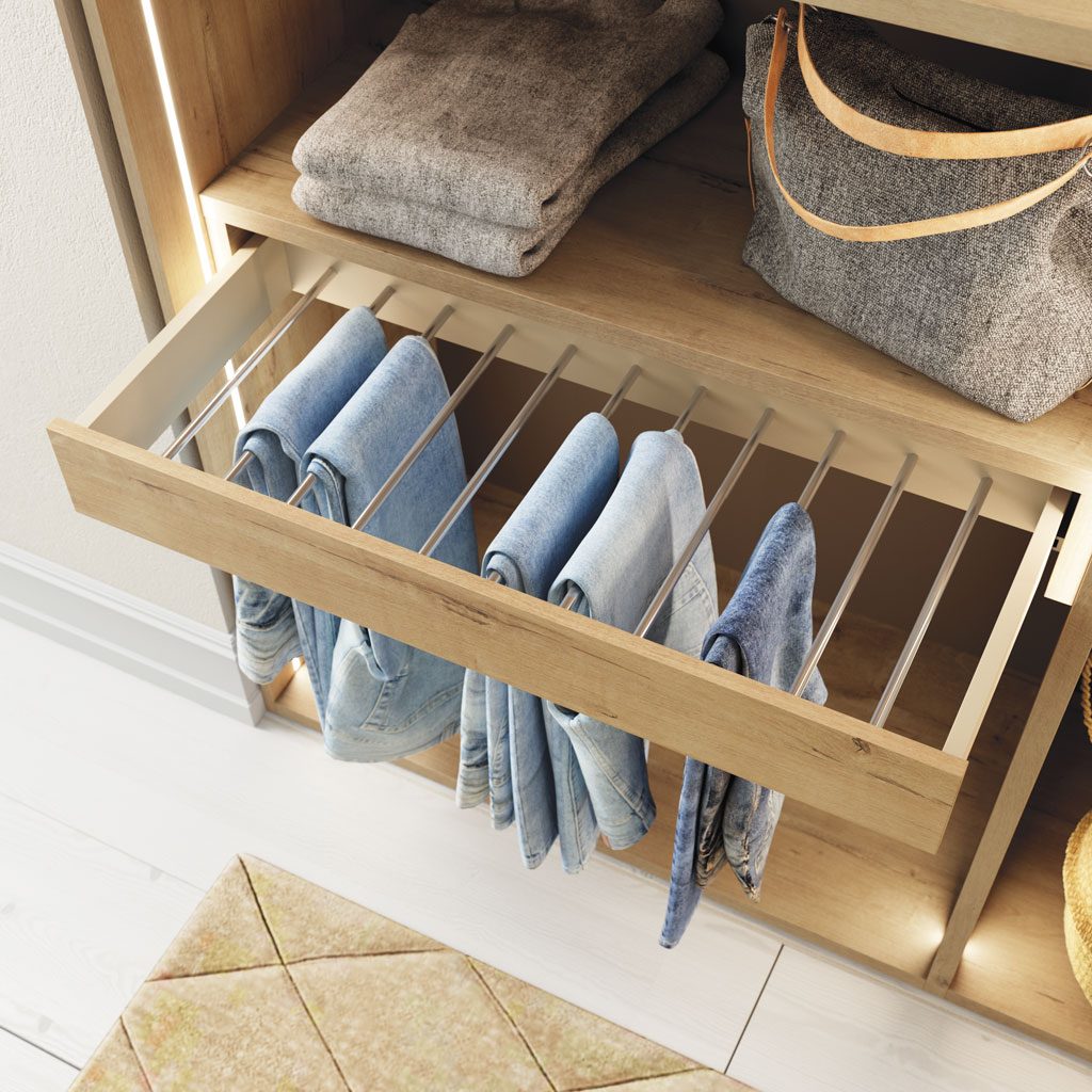 Detail of the pull-out trouser rack with wooden structure for the wardrobe Detail of the pull-out trouser rack with wooden structure for the wardrobe