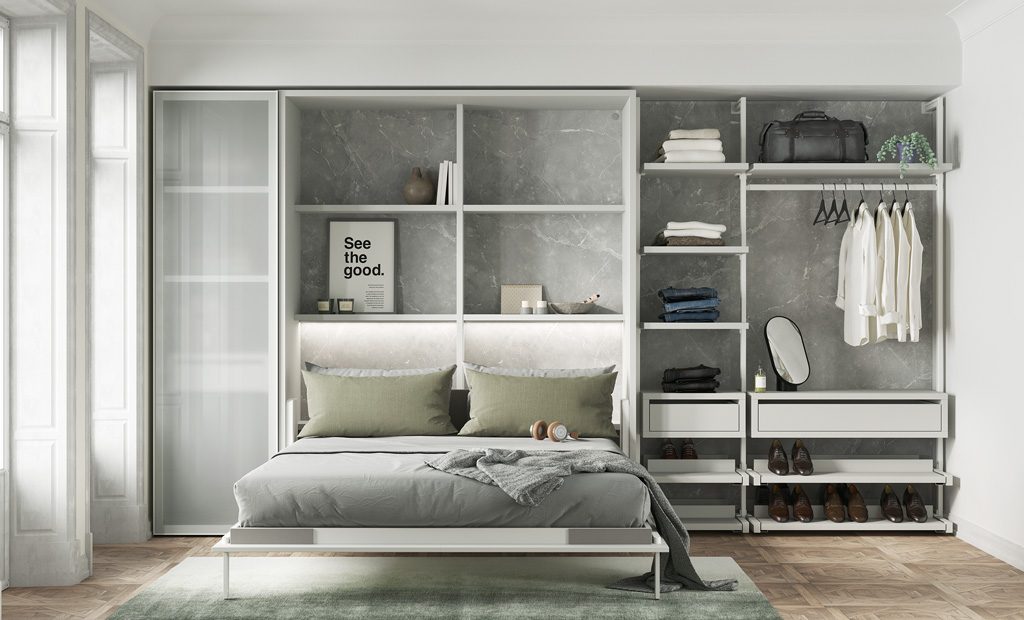 Bedroom with vertical fold-down double bed and open walk-in wardrobe Bedroom with vertical fold-down double bed and open walk-in wardrobe